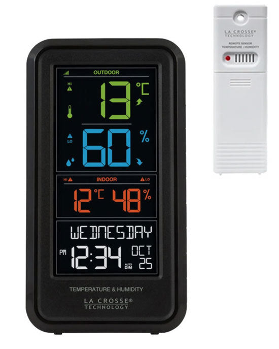 A La Crosse Technology personal weather station with a color display showing indoor and outdoor temperature and humidity readings, along with time and date.