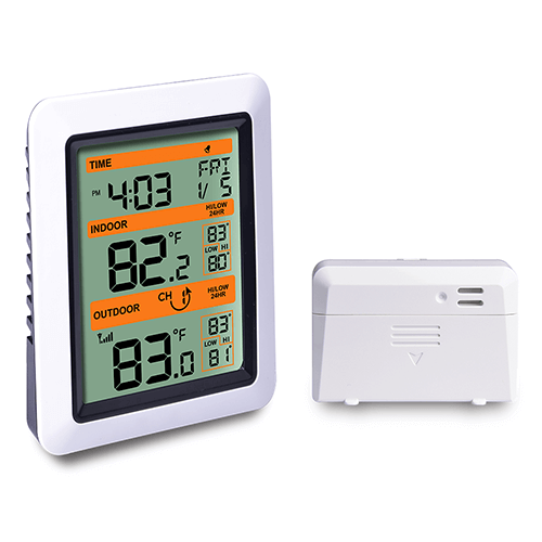 WS0300 TESA wireless thermometer station with an LCD display showing indoor temperature and humidity, and a white sensor module beside it.