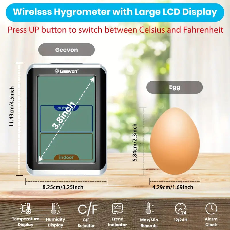Geevon wireless hygrometer with large LCD display on a wooden surface with an egg for scale.