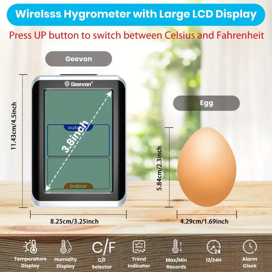 Geevon wireless hygrometer with large LCD display on a wooden surface with an egg for scale.