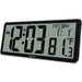Digital clock with time, date, and temperature display on a white background