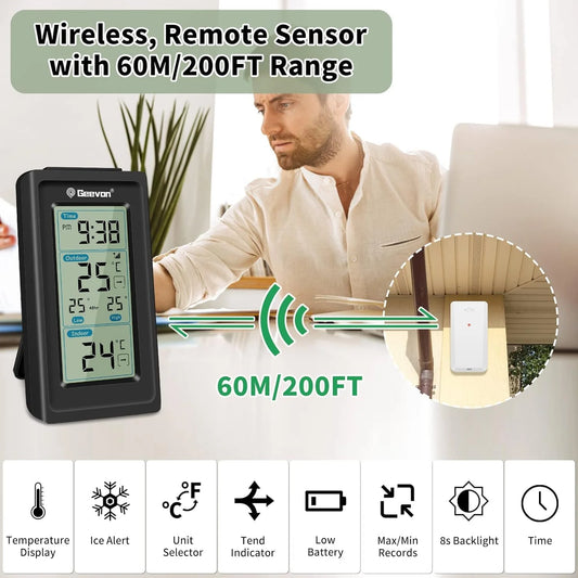 Wireless remote sensor with temperature display and range indicator, man using laptop in background.