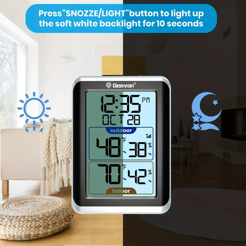 Digital thermometer with weather display on a table, showing indoor and outdoor temperatures.