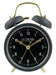 Alarm clock with La Crosse written on it, with a black clock face.