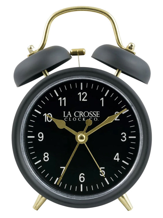 Alarm clock with La Crosse written on it, with a black clock face.