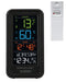 A La Crosse Technology personal weather station with a color display showing indoor and outdoor temperature and humidity readings, along with time and date.