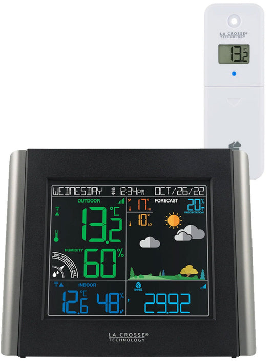 A La Crosse Technology wireless weather station with a color display showing indoor and outdoor temperature, humidity, and weather forecast.