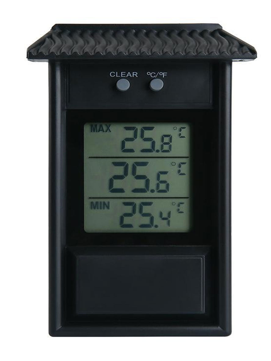Black digital thermometer with temperature display on a white background