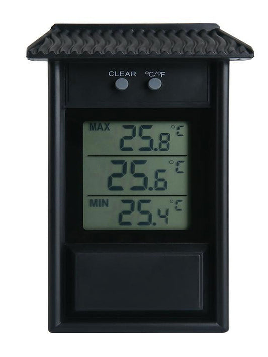 Black digital thermometer with temperature display on a white background