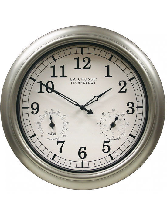 A round, silver-colored La Crosse indoor or outdoor wall clock with a metallic finish and analog display showing time, temperature, and humidity.
