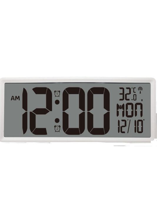 A digital LCD wall clock displaying the time, indoor temperature, and date on its screen.
