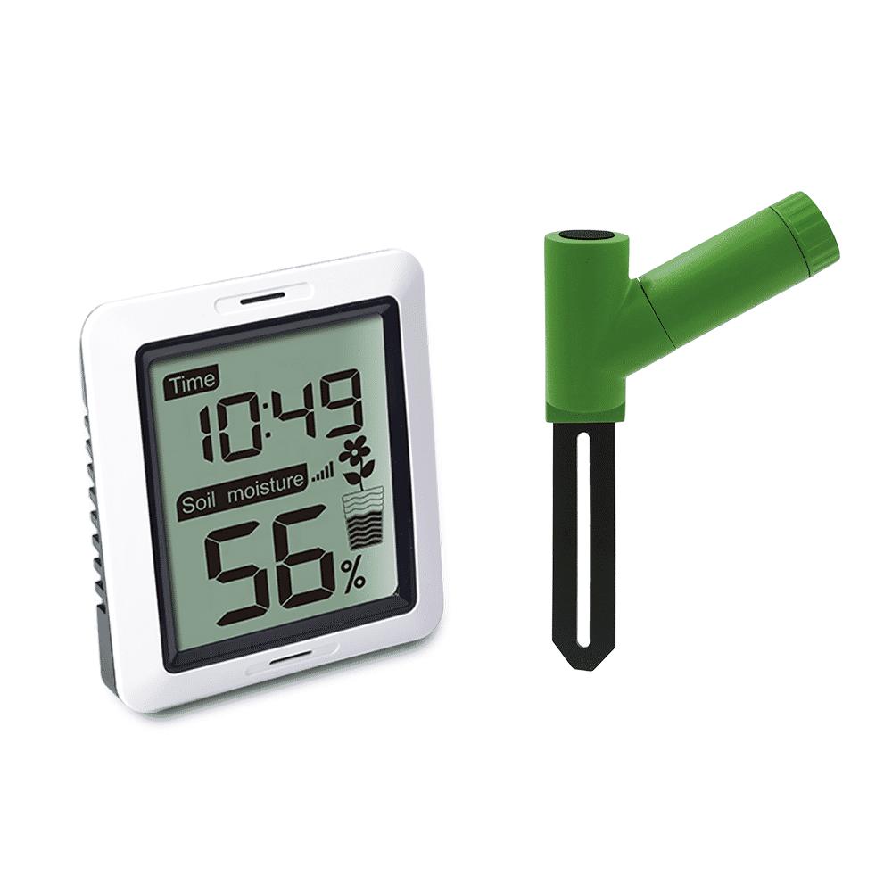 A soil moisture display station with a digital LCD screen and a green sensor probe.