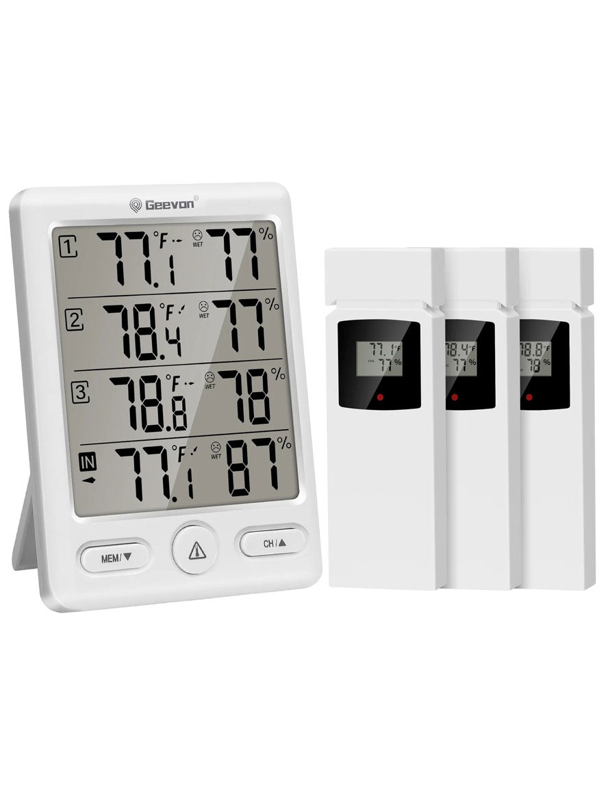 Digital thermometer with three additional thermometers on a white background
